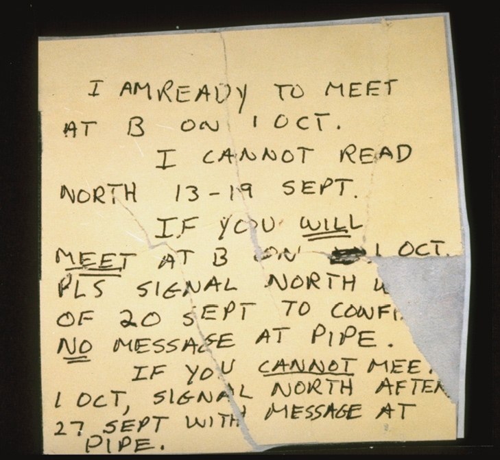 A handwritten message from Ames to his KGB handlers arranging a dead drop of - photo 19