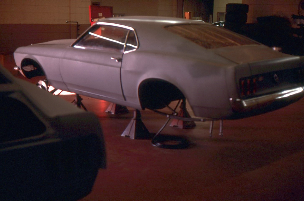 A very historic picture The Mustang in its original grey sitting on jacks in - photo 15