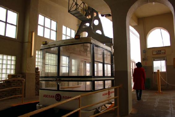 Here an empty ropeway car waits in the lower station for the next departure - photo 9