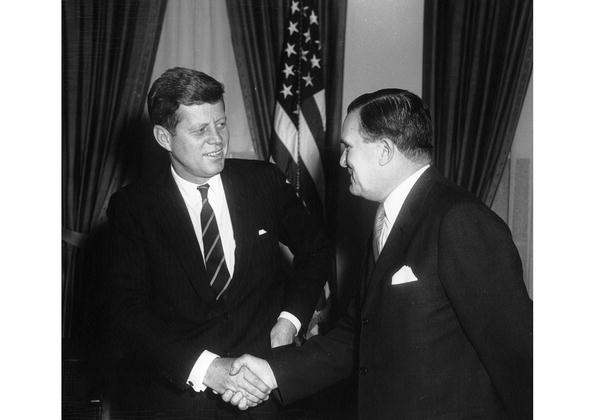 President Kennedy shakes hands with NASA Administrator James E Webb during a - photo 1