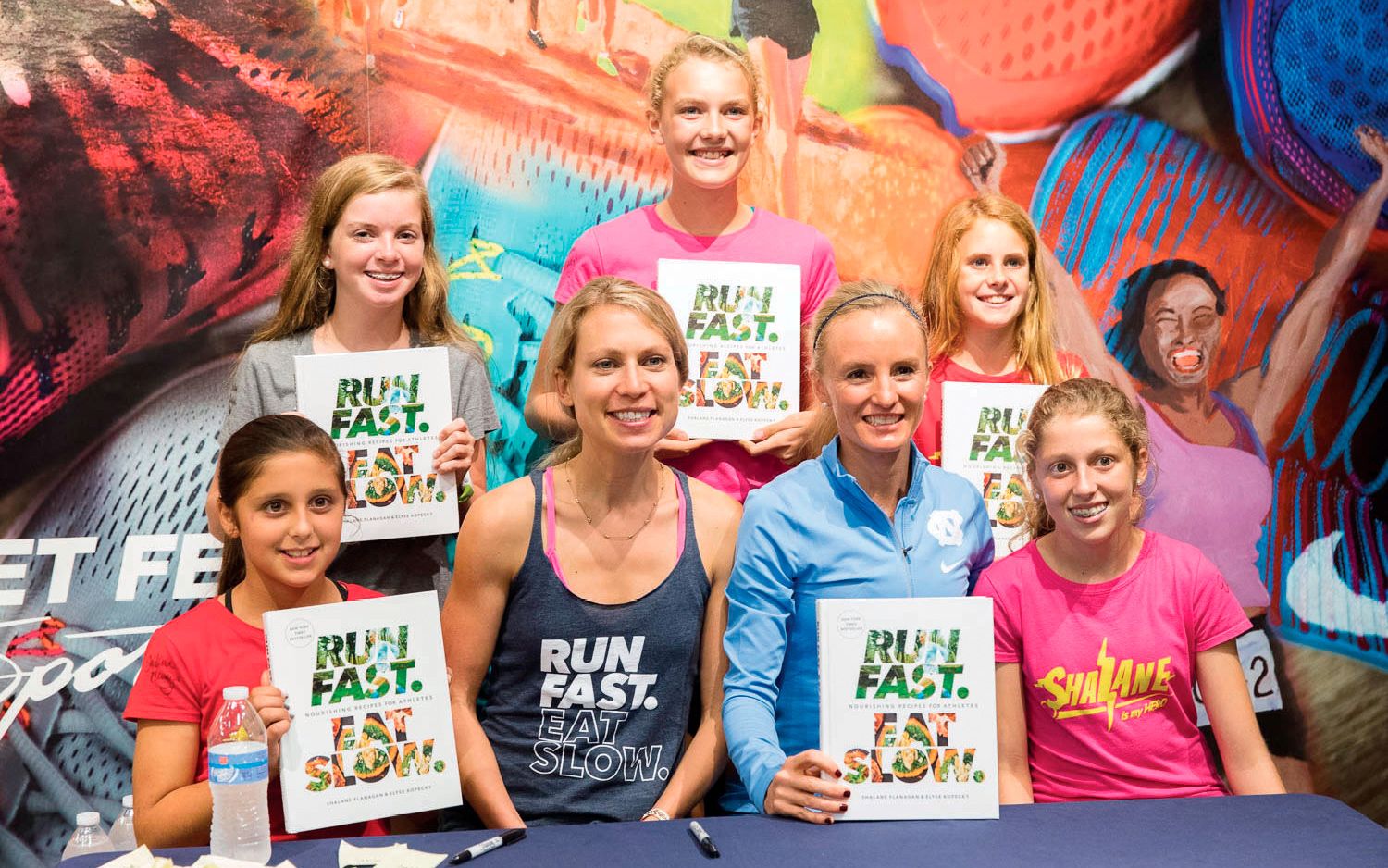 Shalane and Elyse with a group of young fans at a book tour event hosted by - photo 5