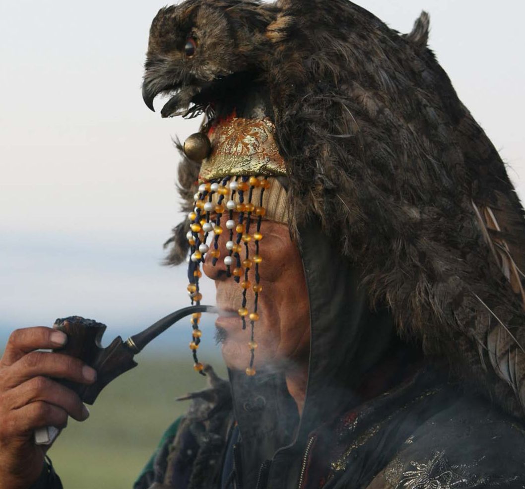 A Tuvan shaman awaits the summer sunrise Tuva Republic Northwest Asia THE - photo 6