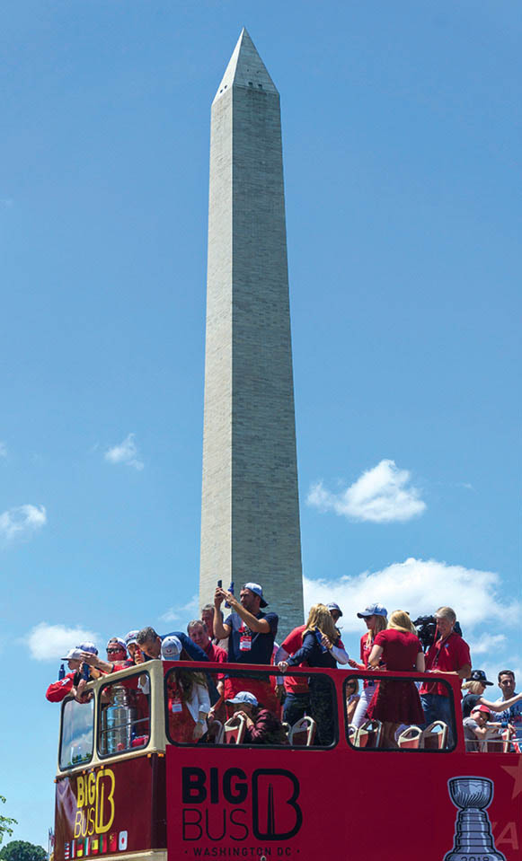 The Washington Capitals parade through downtown Washington DC to celebrate - photo 17