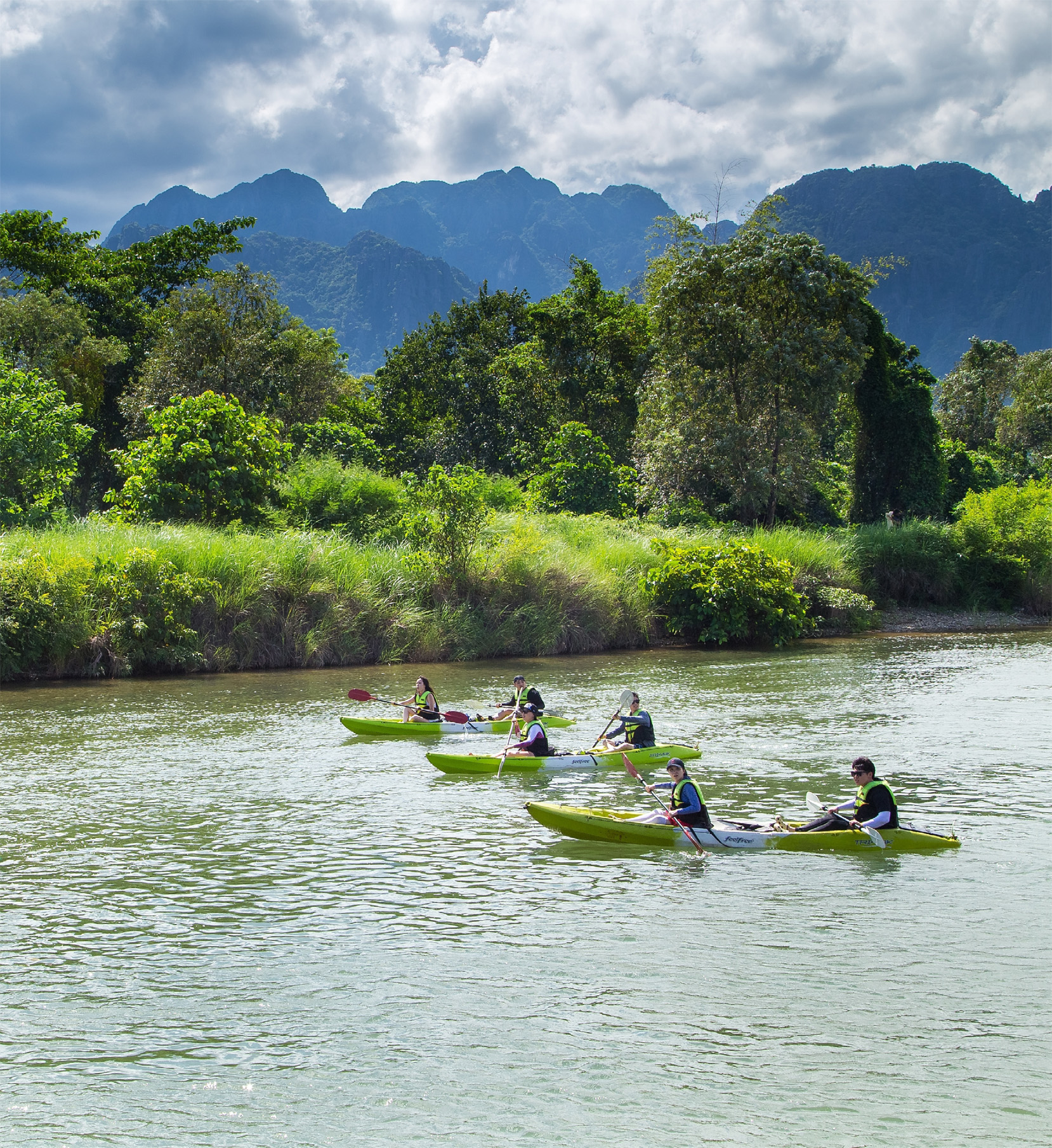 Paddling along the Nam Song is the best way to take in the towering karsts - photo 12