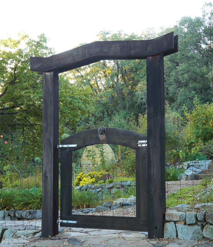 A gate marks the official entry to the authors garden but heady fragrances - photo 7