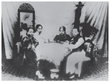 Wealthy Chinese women playing Mah Jongg towards the end of the last Imperial - photo 4