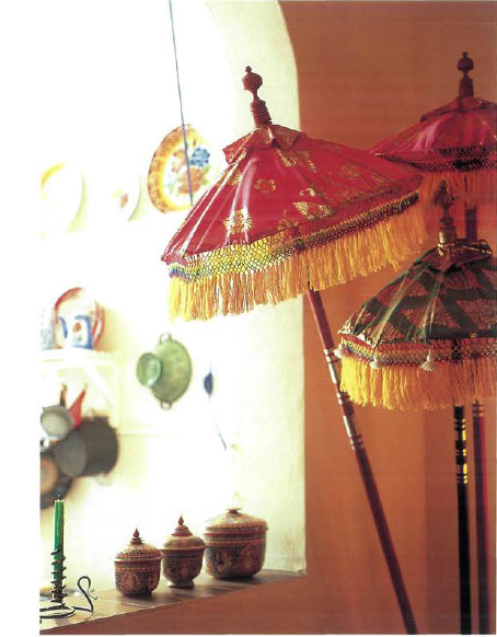 In a corner of the dining room festive Balinese umbrellas are arranged like - photo 9