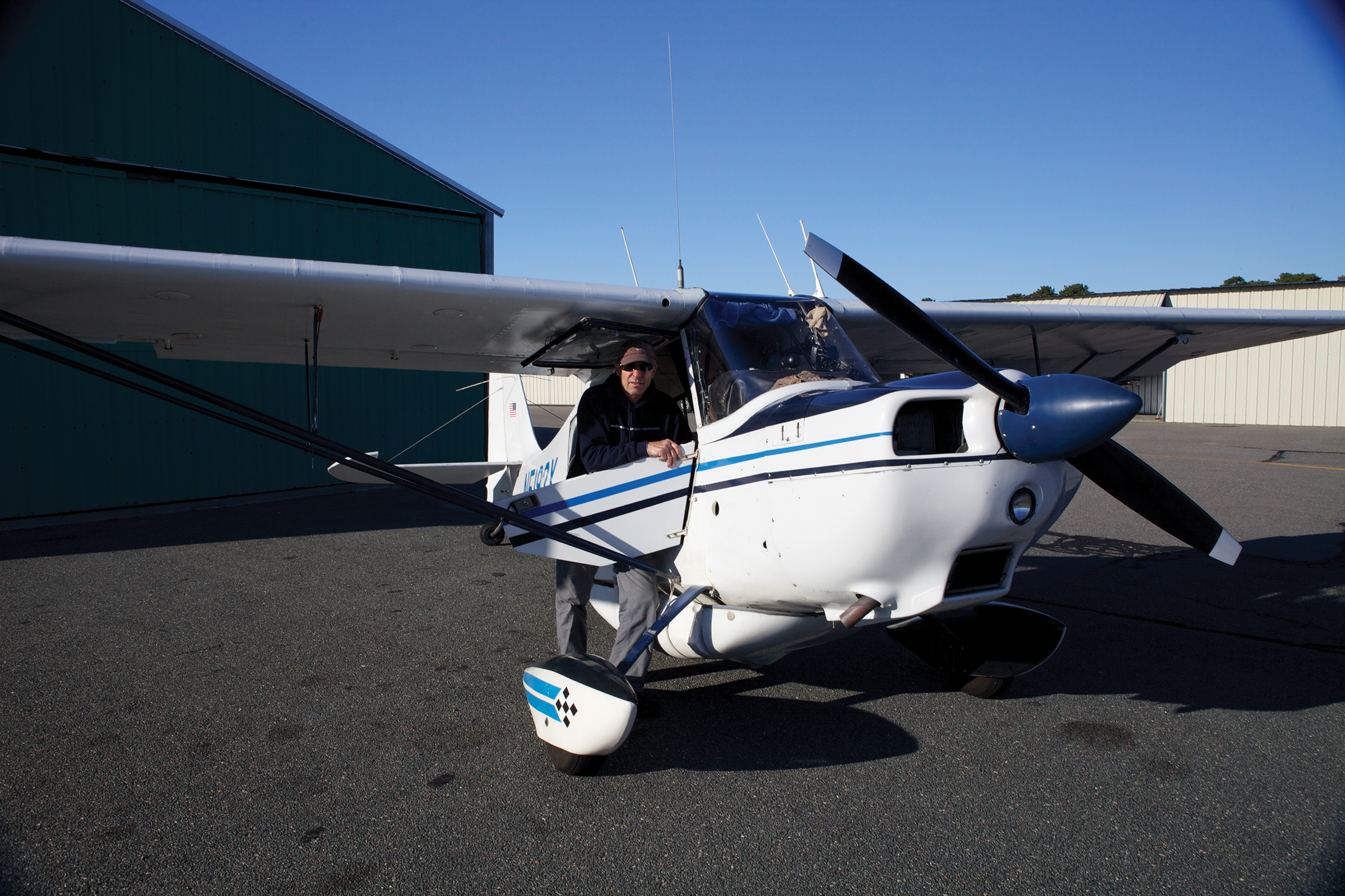 Wayne Davis with his single-engine Citabria Chatham Inlet is a pretty - photo 10