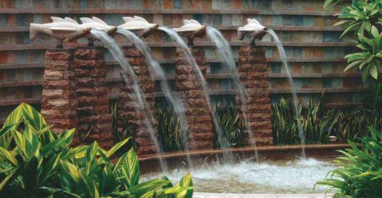 Encircling the childrens pool carved gray granite fish on stacked stone bases - photo 11