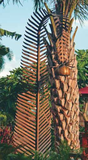 I love this design for a pool shower A big bronze coconut leaf bends like a - photo 13