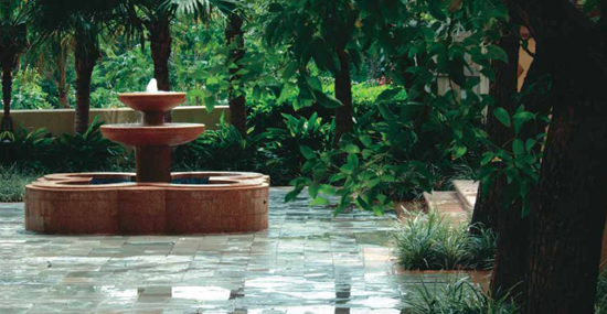 This simple tiered fountain is the focal point of the elegant entrance plaza of - photo 15