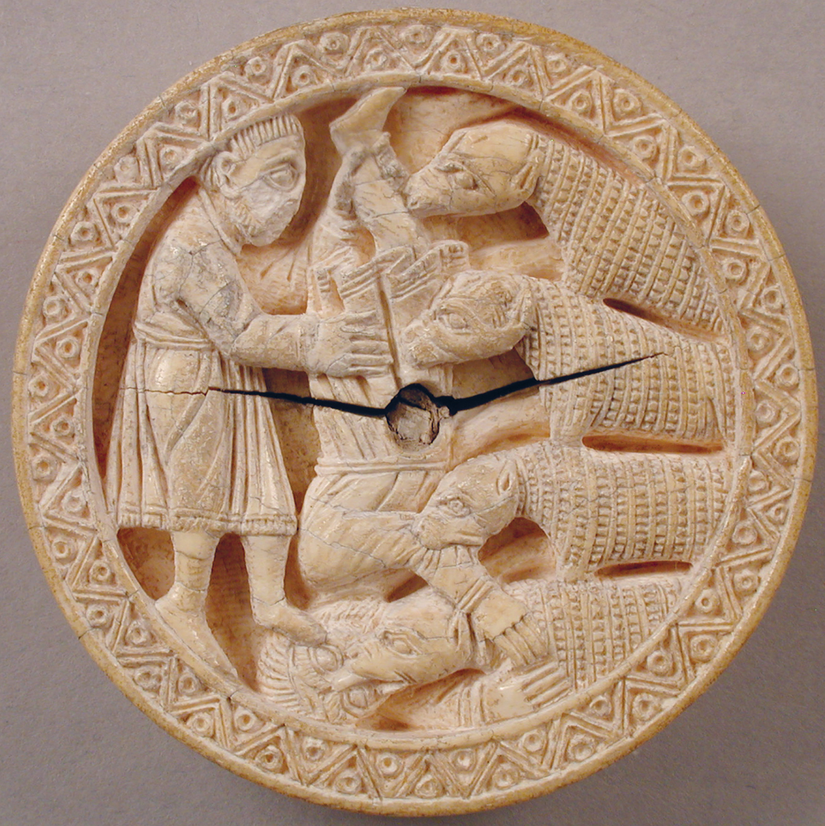 A twelfth-century game piece showing Hercules feeding Diomedes to his own - photo 4