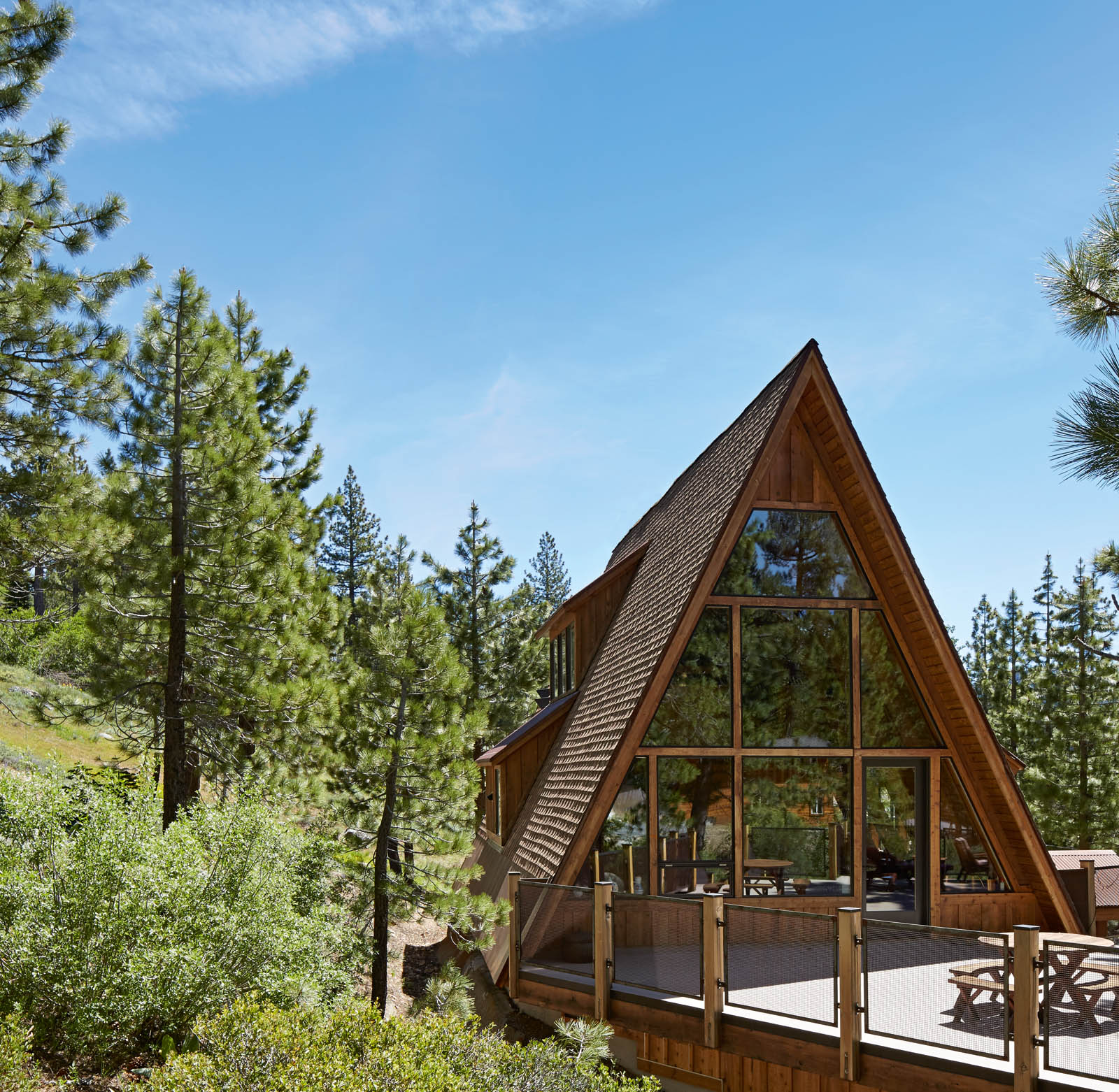 A remodeled 1959 A-frame in the Sierra Nevada Mountain Range serves as the - photo 3