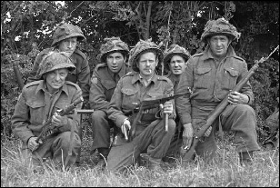 Members of A Company pose near Anguerny June 8 1944 Front row Syd Cable - photo 3