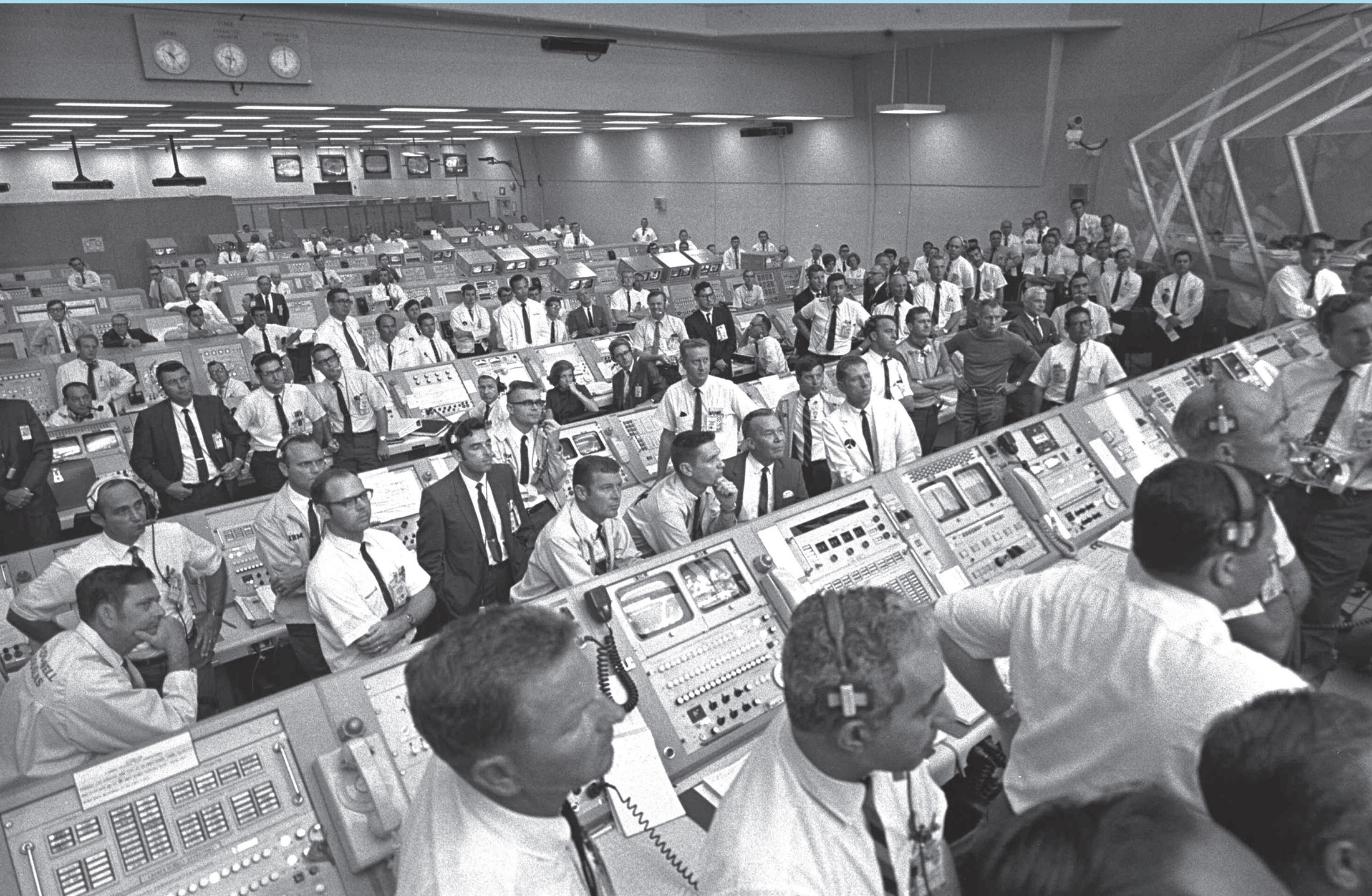 In the Firing Room members of the launch team view the liftoff after Apollo 11 - photo 5