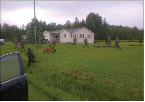 Residents of the local area saw law enforcement searchers everywhere Photo - photo 16