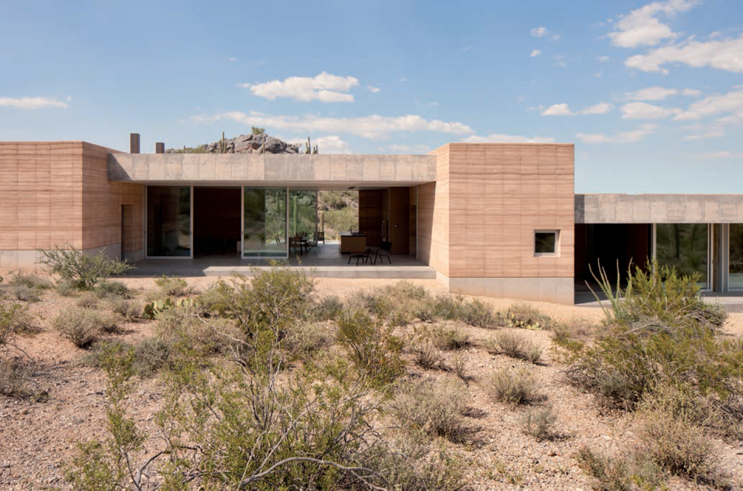 The main living area and the sleeping spaces extend into south-facing patios - photo 10