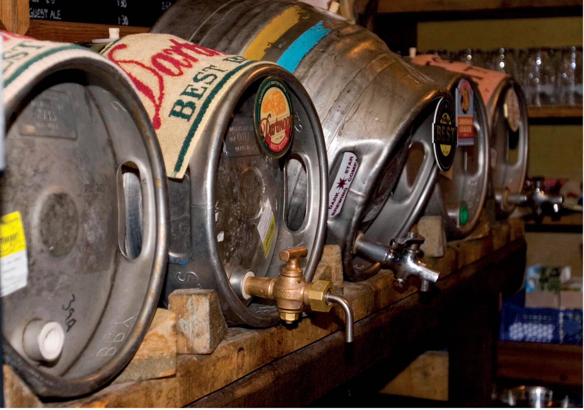 Cask ale barrels on traditional stillage at The Rugglestone Inn Devon a sight - photo 7