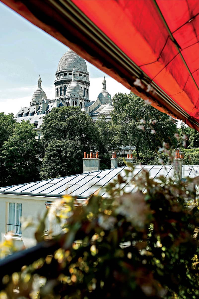 The Sacr-Coeur Basilica is built on top of la butte Montmartre the highest - photo 9