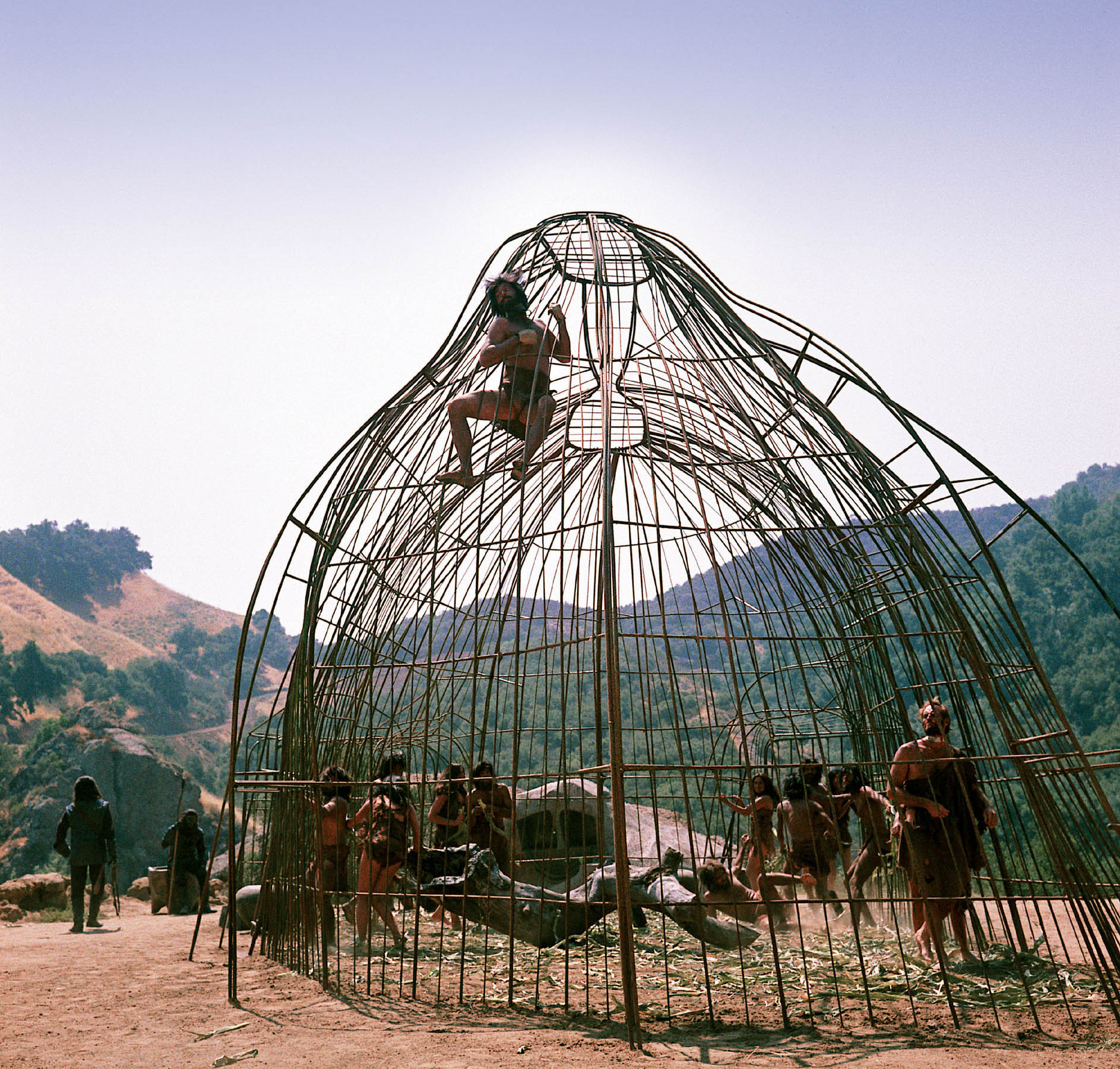 Taylor Heston observes one of the planets primitive humans climbing the bars - photo 2