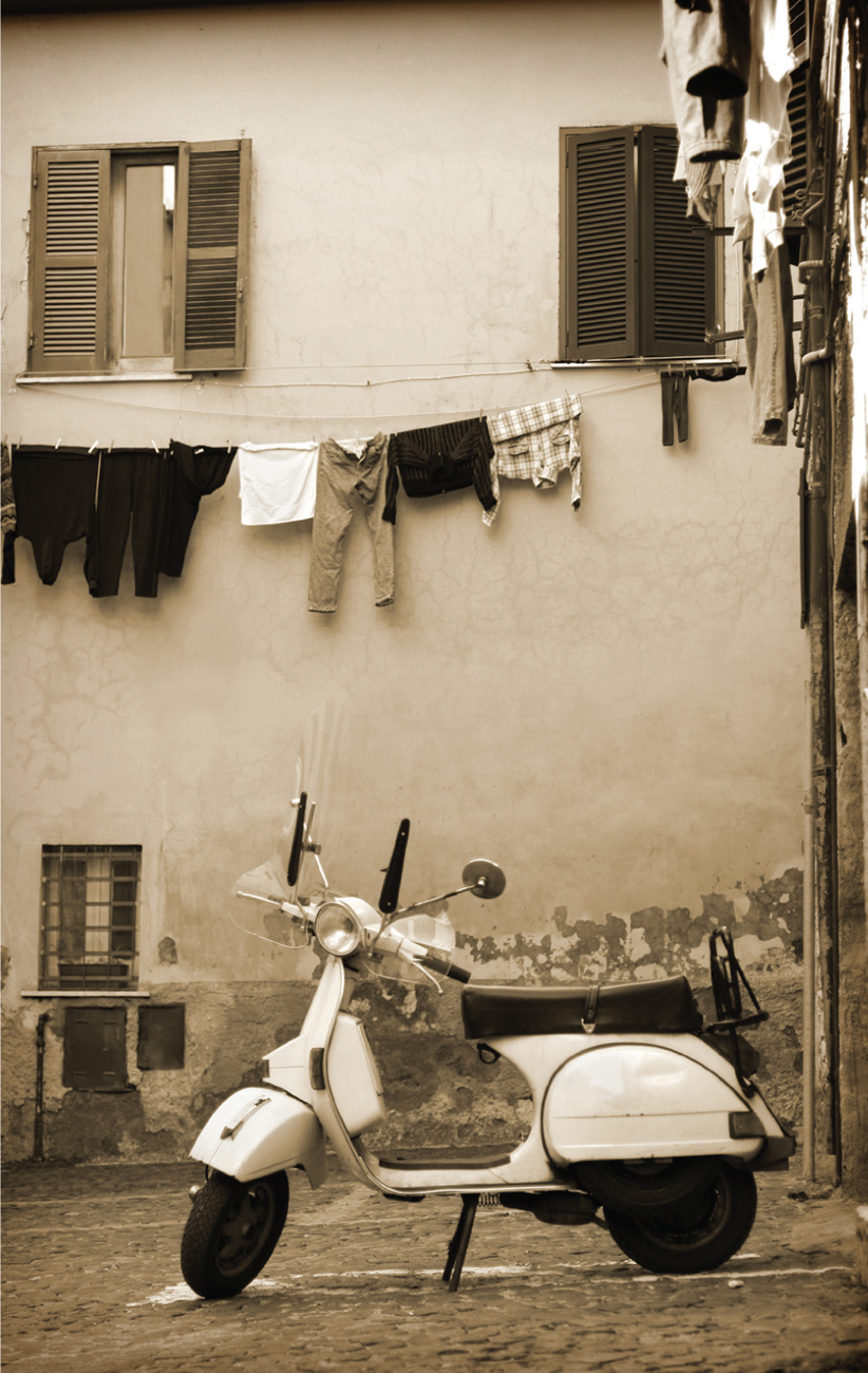 A vintage scooter in a village square in Lazio Italy perhaps the nation where - photo 9