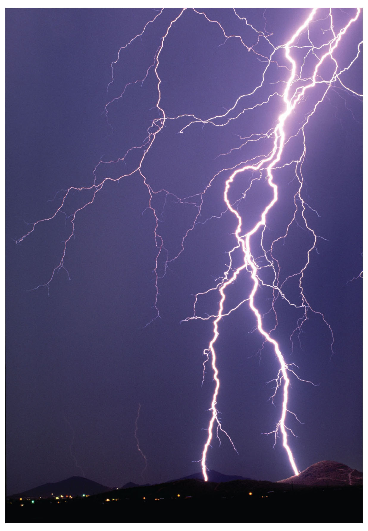 Lightning bolts strike the foothills south of Tuscon AZ A Dangerous Pursuit - photo 5