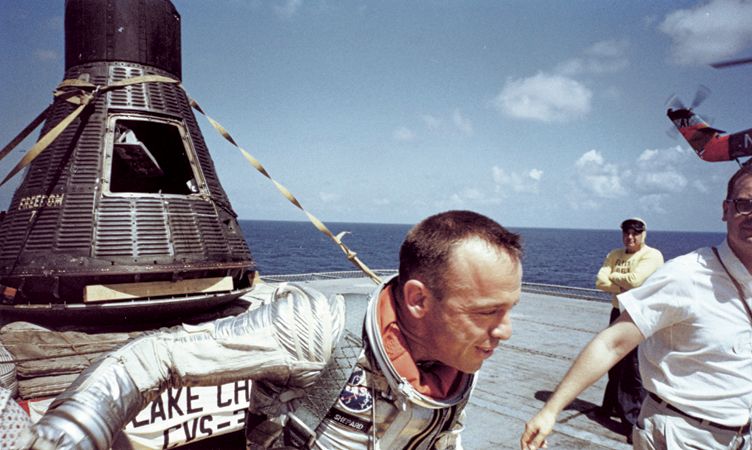 MPIGETTY THE ORIGINAL space cowboy Alan Shepard sprints from his capsule - photo 9