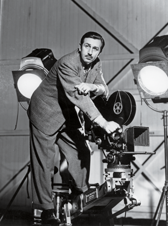 GRANGER WALT DISNEY IS SHOWN IN 1944 the year he released The Three - photo 6