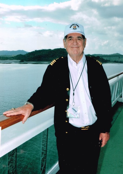 I stand on the bridge in my white pilots uniform as the PO Cruises ship MV - photo 3