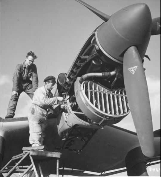 The ground crew at work on the engine of a Stuka Russia 1944 Coming out of a - photo 4