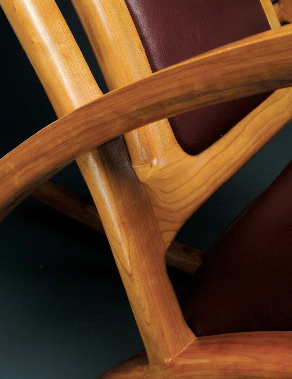 The curved chair arm in this close-up photo was made by gluing many thin layers - photo 3