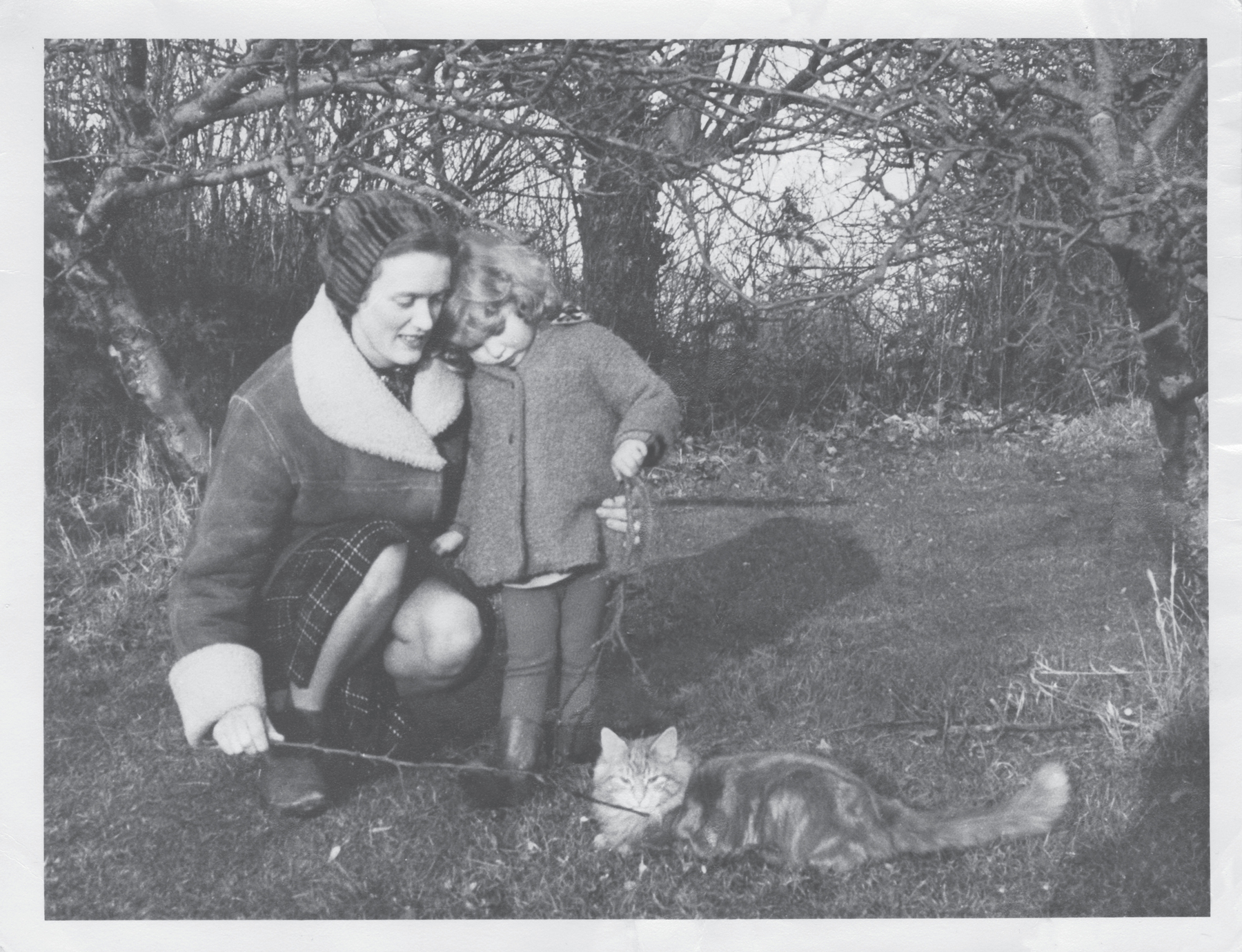 My mother me at age 3 and my cat Freddy also age 3 in our garden in - photo 3