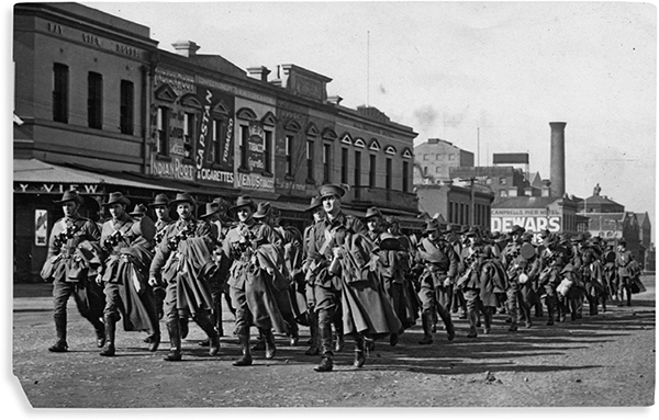 Putting himself forward Bill Knox leads his men through the streets of Port - photo 3