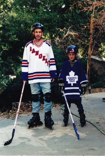 Winslow and his son playing roller hockey Once a safari guide in Africa - photo 9