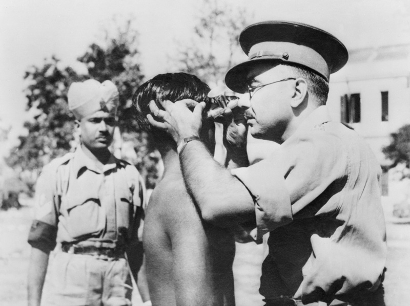 A Recruiting Officer inspects a potential recruit in Northern India There was - photo 6