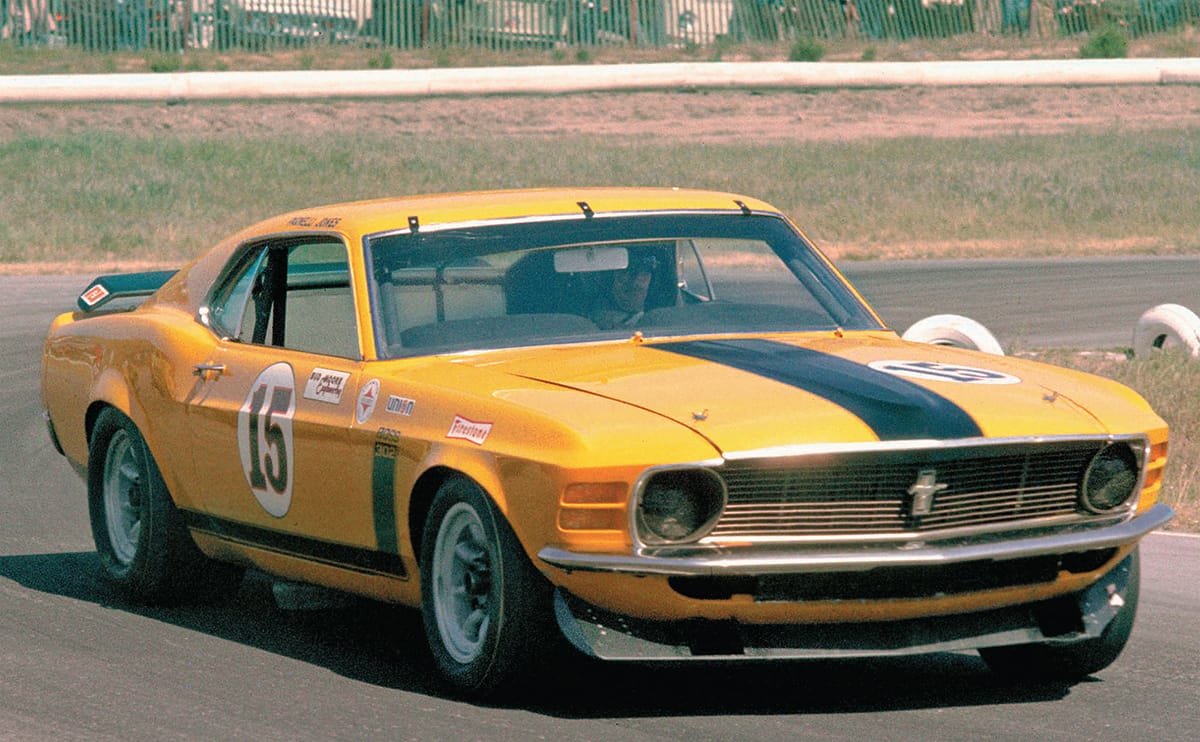 Parnelli Jones won three of the first four races to give Ford a big lead in the - photo 6