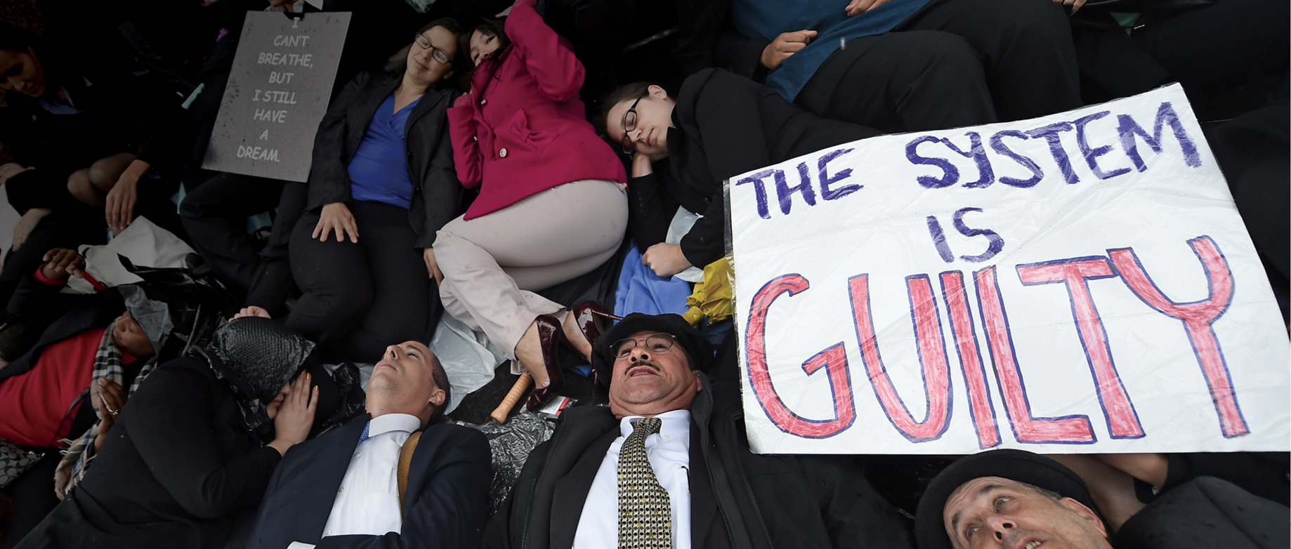 Protesters in Los Angeles California stage a die-in demonstration to raise - photo 3