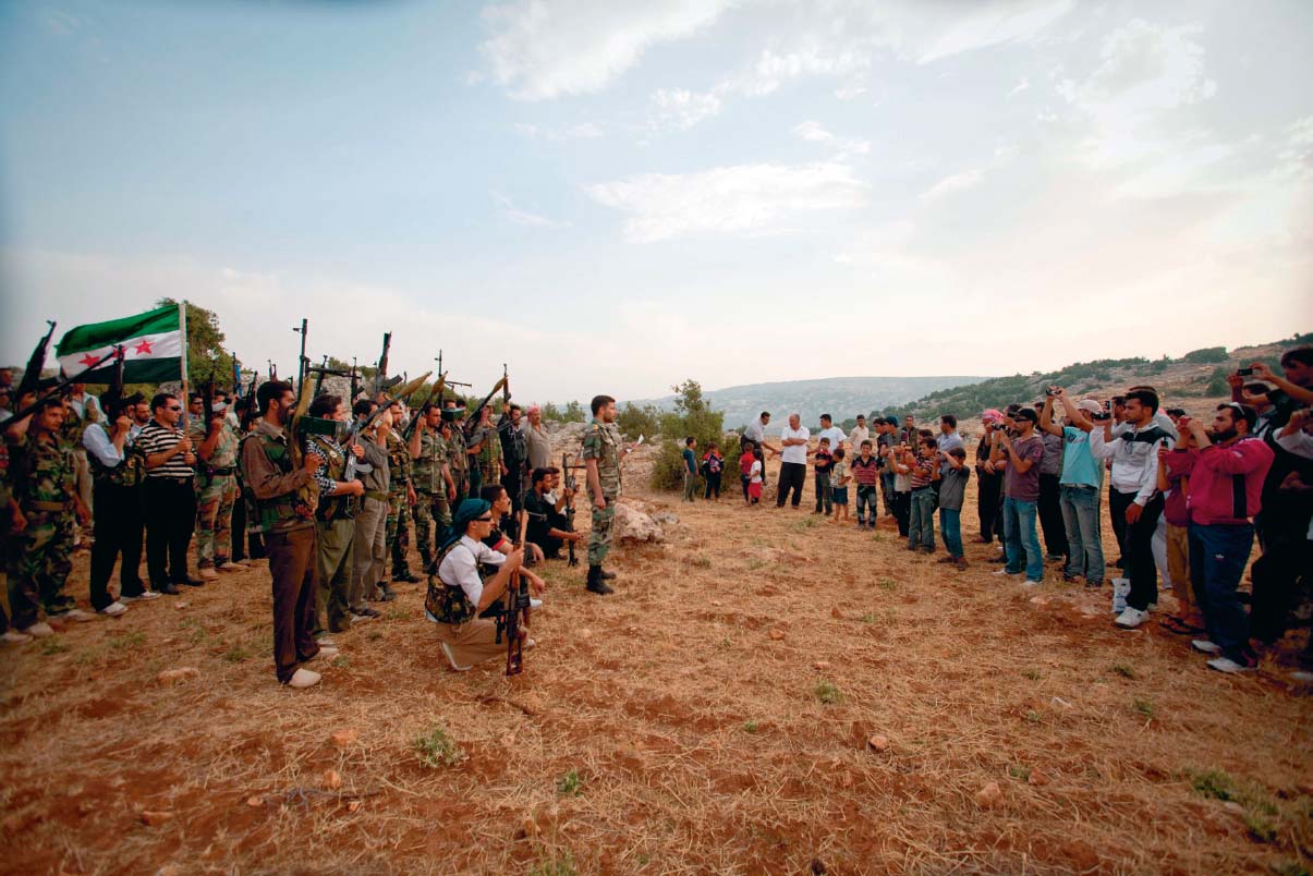 Rebels with the Free Syrian Army announce the formation of their brigade in - photo 17