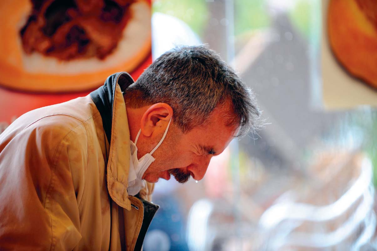 A man recovers from the water cannons and tear gas used by Turkish police - photo 19