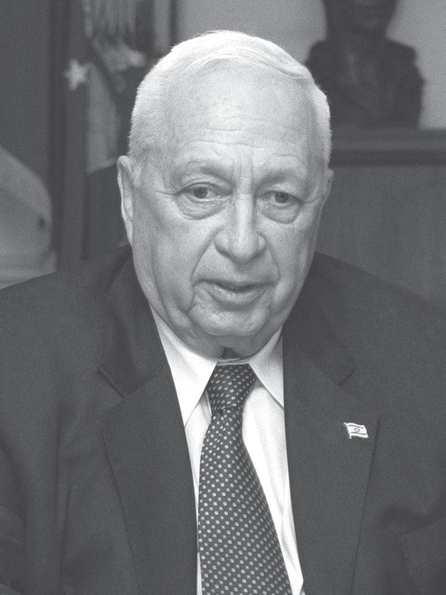 Israeli Prime Minister Ariel Sharon pictured during a defense meeting held at - photo 5