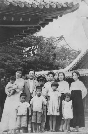 My family in 1956 I am the baby and that is my mother holding me Right of - photo 2