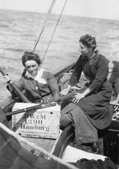 Molly Childers left holding rifle and Mary Spring-Rice running guns from - photo 2