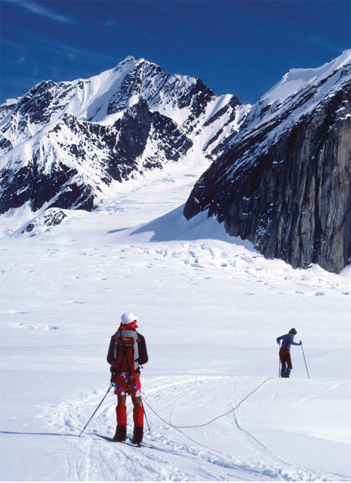 Backcountry skiers roped together cross the Alaska Ranges Ruth Glacier while - photo 4