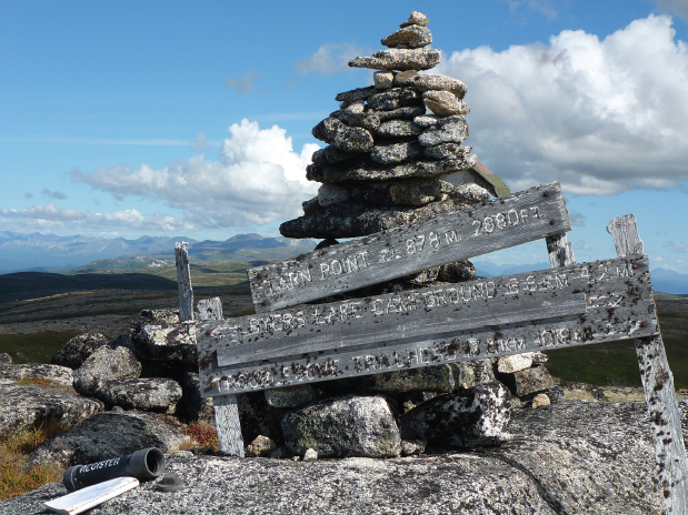 A signpost rock cairn and backpacker register mark Tarn Point along Denali - photo 18