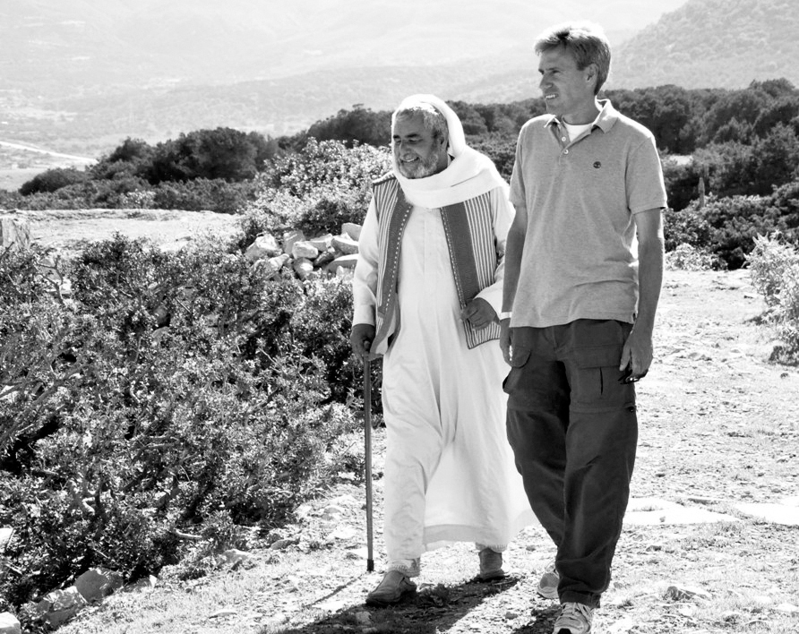 Chris Stevens walking with an elderly Libyan hes just befriended on a visit to - photo 4