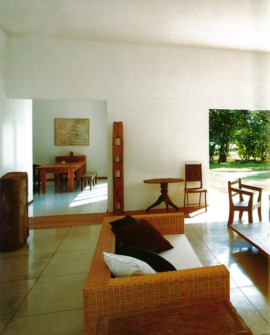 The guest living room in a Japanese art lovers home looks out to a sun-dappled - photo 5