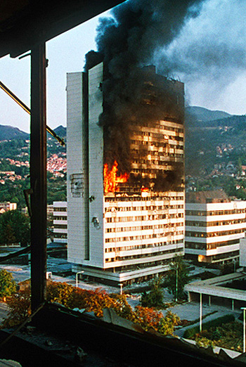 A government building in central Sarajevo after being hit by tank fire in 1992 - photo 5