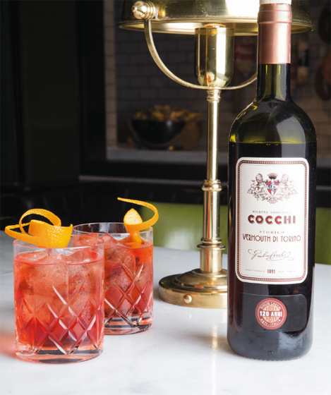 Simple and refreshing Cocchi Vermouth di Torino poured over ice garnished - photo 7
