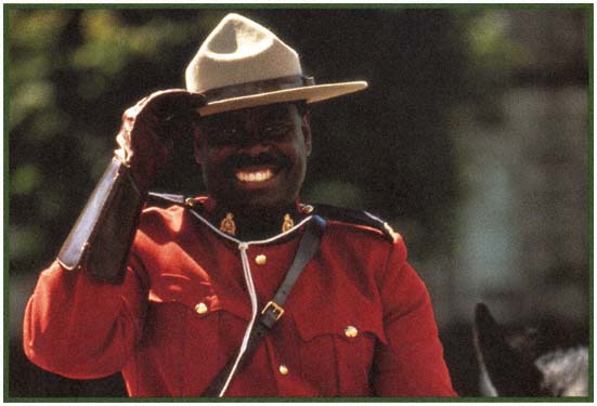 A member of the Royal Canadian Mounted Police Bonjour Good day Welcome - photo 3