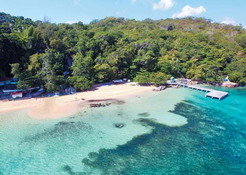 the beach at the mouth of Dunns River Falls Its hard to argue when Jamaicans - photo 10